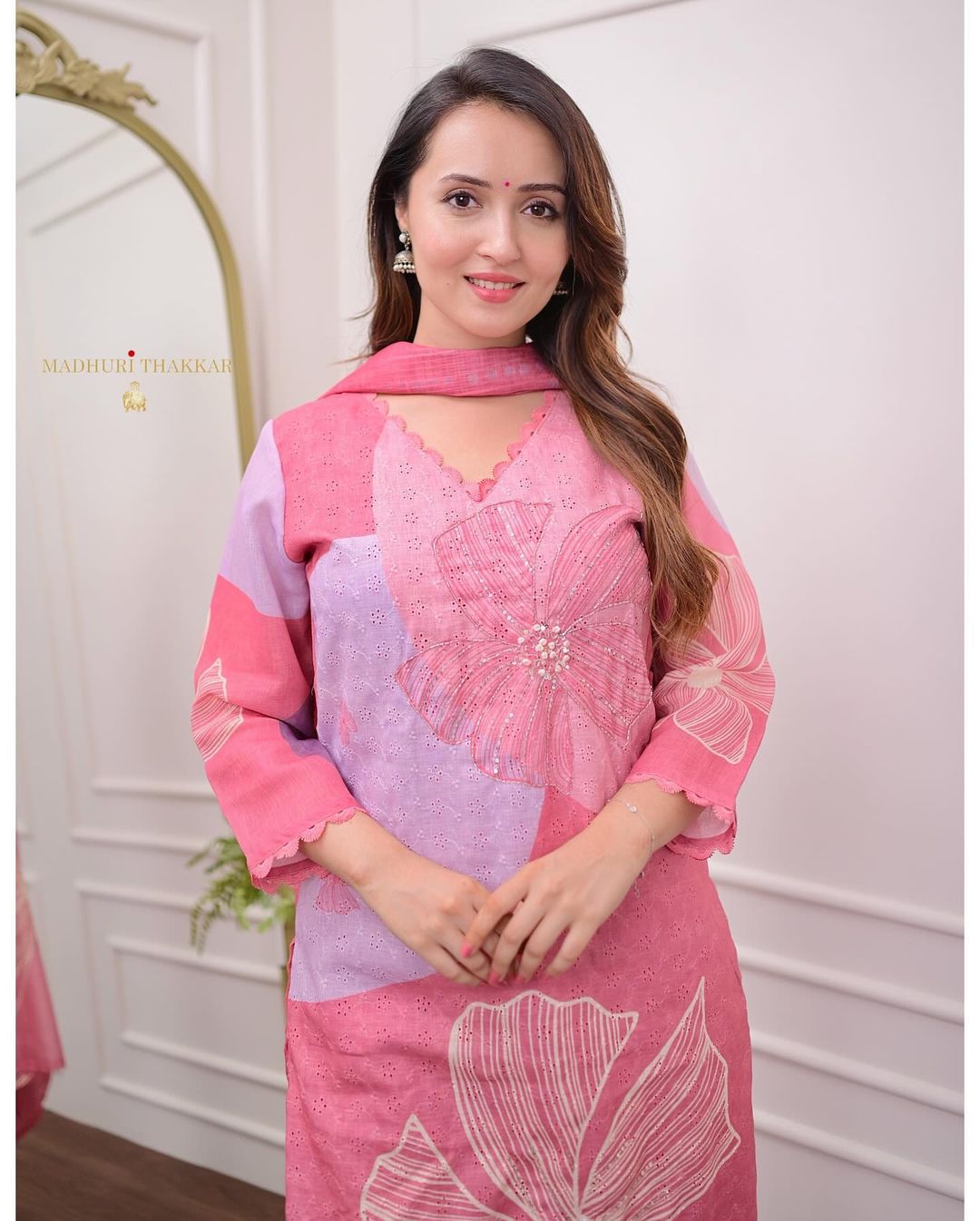 Model wearing Pink embroidered Shifli Linen 3-piece suit set with handwork and digital prin